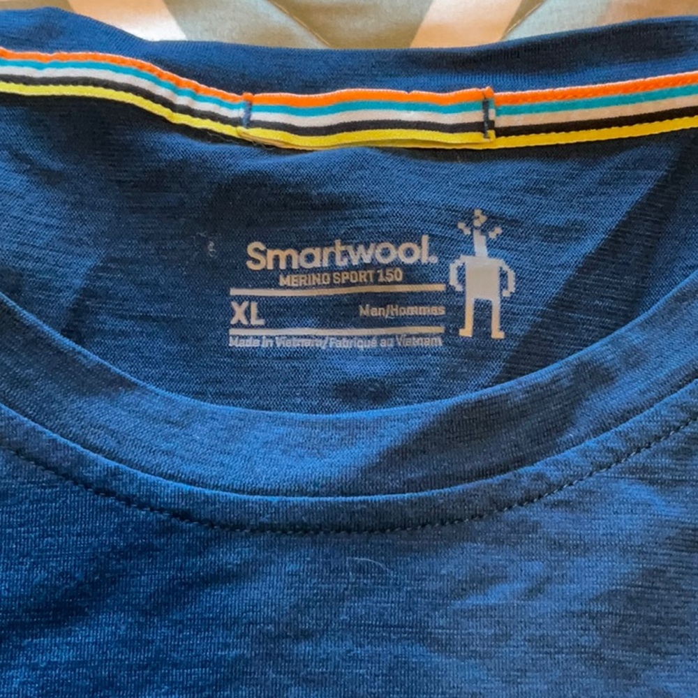 Smartwool Men’s Merino Sport 150 Graphic long sleeve shirt. Size XL, color blue.